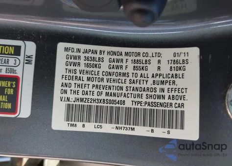 2011 Honda Insight from USA, damaged, VIN JHMZE2H3XBS005408